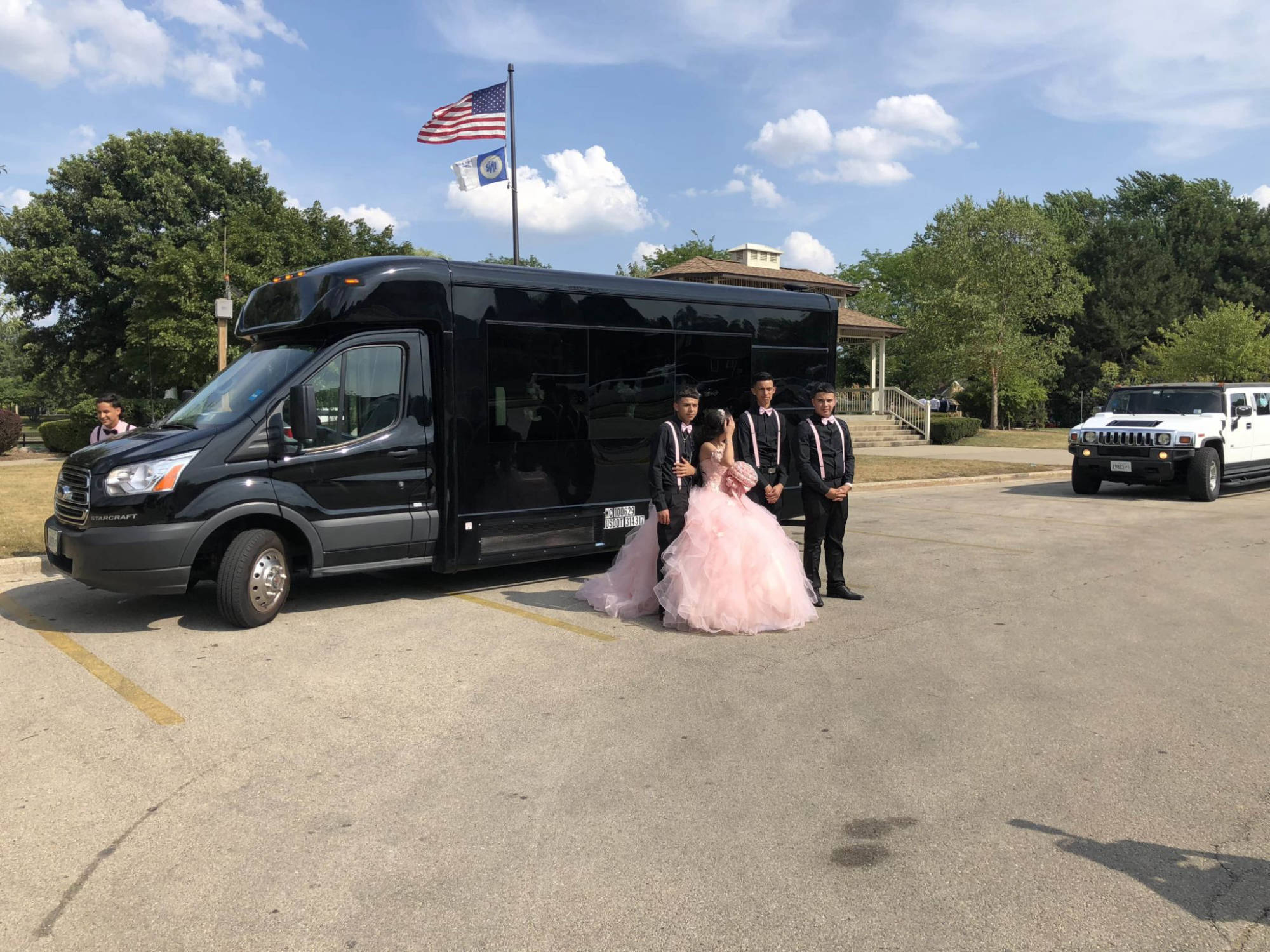 Chicago party-bus group standing with the coach